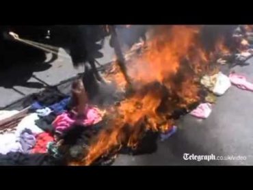 Yemeni women burn their veils in plea for help as government violence continues