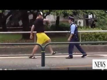 警官を暴行した大男がねじ伏せられる