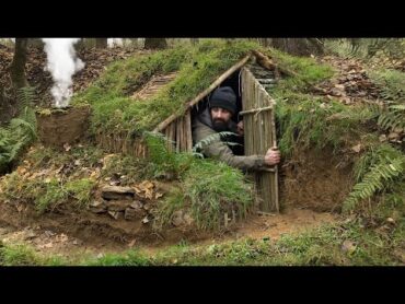 Building complete and warm survival shelter  Bushcraft earth hut, grass roof & fireplace with clay