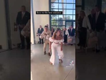 A Wedding Entrance You Won’t Forget 👏👰‍♀️🏈 wedding weddingvideo funnywedding weddingentrance