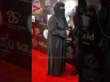امراة منقبة سعودية في مهرجان ايجي فاشون