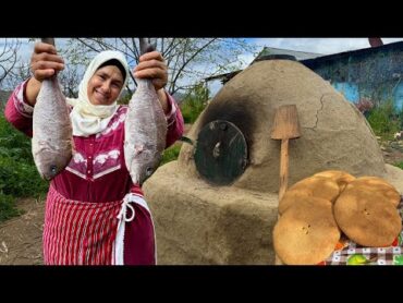 اعداد خبز القمح مع السمك المحشي في فرن تقليدي