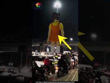 شارع يتحول إلى لعبة الحبار: هل تجرؤ على العبور؟ 😱